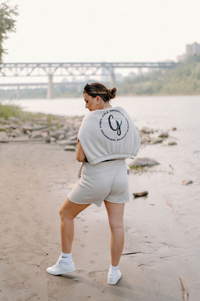 The "Women Empower Women" Cinched Bottom Hoodie