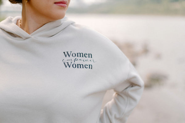 The "Women Empower Women" Cinched Bottom Hoodie